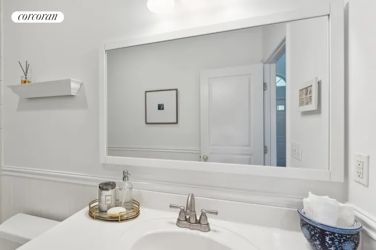 New York City Real Estate | View 104 Whippoorwill Lane | Downstairs Full Bath | View 17