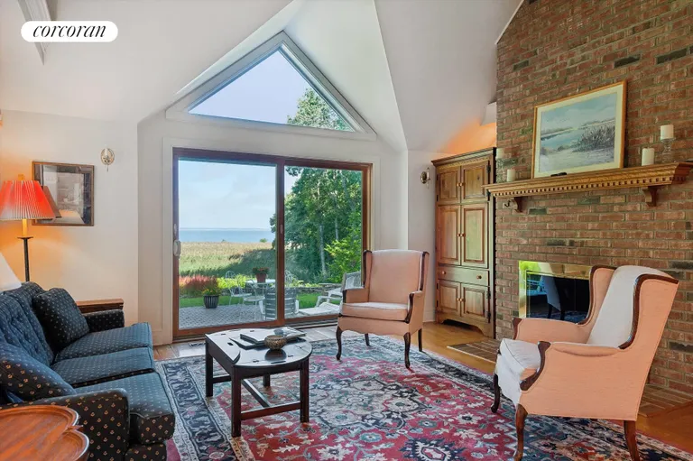 New York City Real Estate | View 156 Ram Island Drive | Family Room With Gas Fireplace | View 11