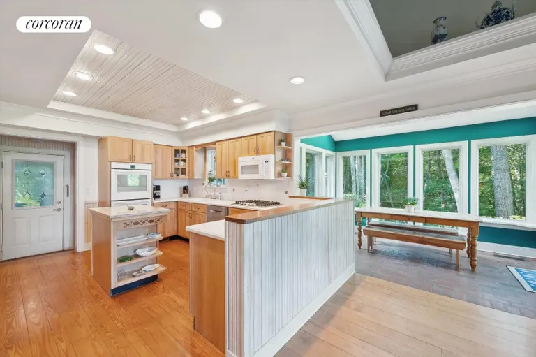 New York City Real Estate | View 156 Ram Island Drive | Kitchen and Sunroom | View 15