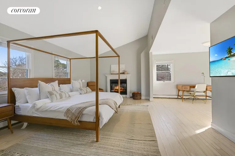 The Hamptons Real Estate | View 36 Charla Drive | Primary Suite with Fireplace | View 13
