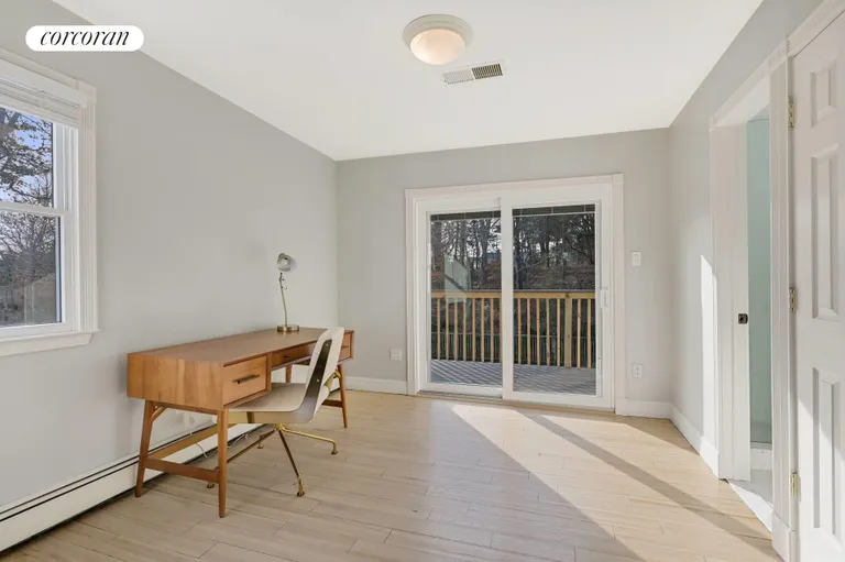 The Hamptons Real Estate | View 36 Charla Drive | Primary Suite with Balcony | View 14