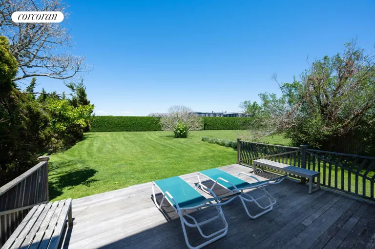 New York City Real Estate | View 63 Meadow Lane | Large deck overlooking the lawn | View 19