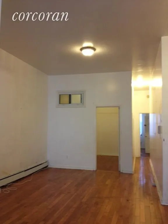 New York City Real Estate | View 293 Tompkins Avenue, 1 | Living room looking into office | View 3