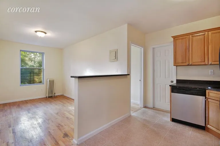 New York City Real Estate | View 12 Mother Gaston Boulevard, 3 | Kitchen / Living Room | View 2