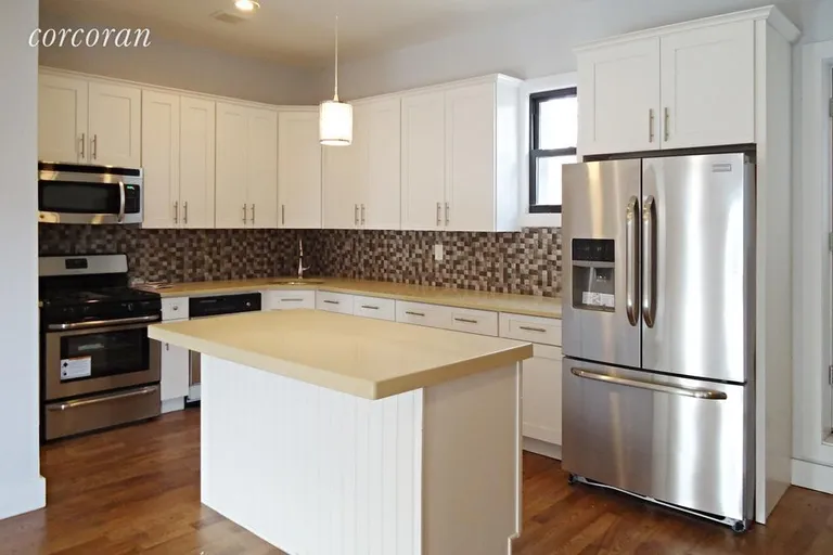 New York City Real Estate | View 913 Herkimer Street, #2 | Modern kitchen with stainless steel appliances | View 2