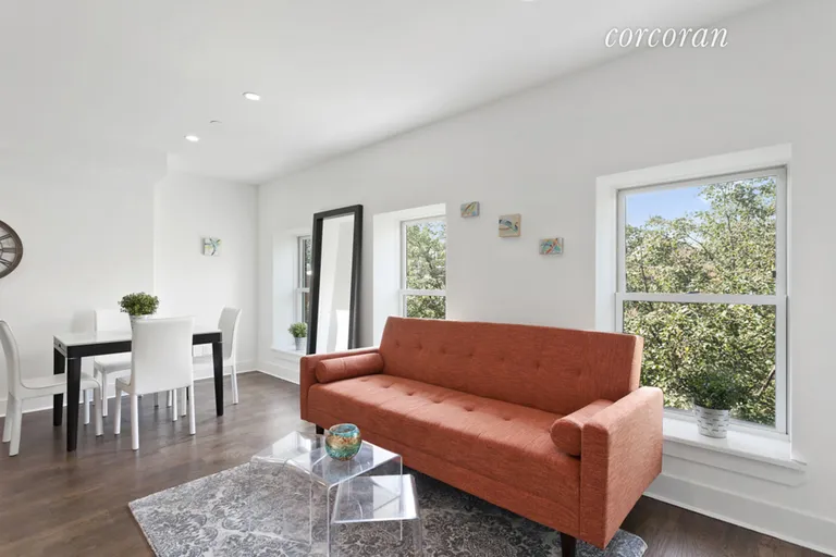 New York City Real Estate | View 350 22nd Street, 1F | Sunny living room with tree top views | View 2