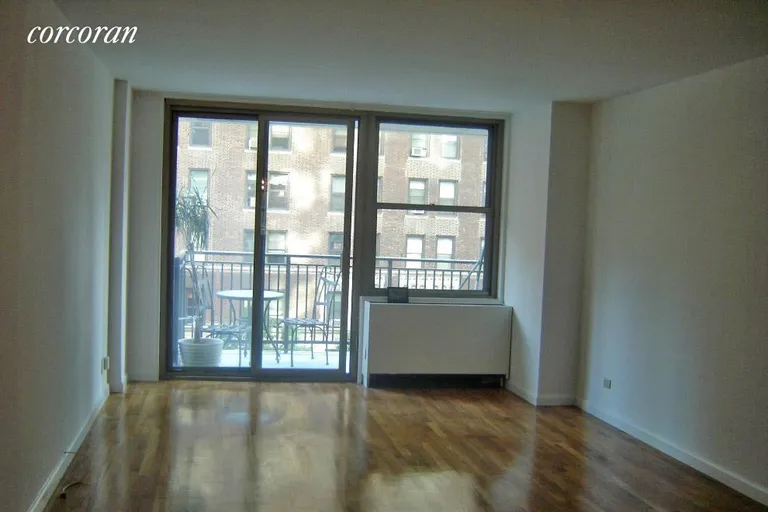 New York City Real Estate | View 301 East 79th Street, 4N | Living Room with Dining Area | View 3
