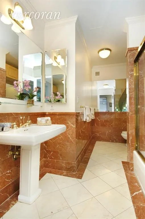 New York City Real Estate | View 22 West 66th Street, 2A | Massive en-suite marble master bath | View 7