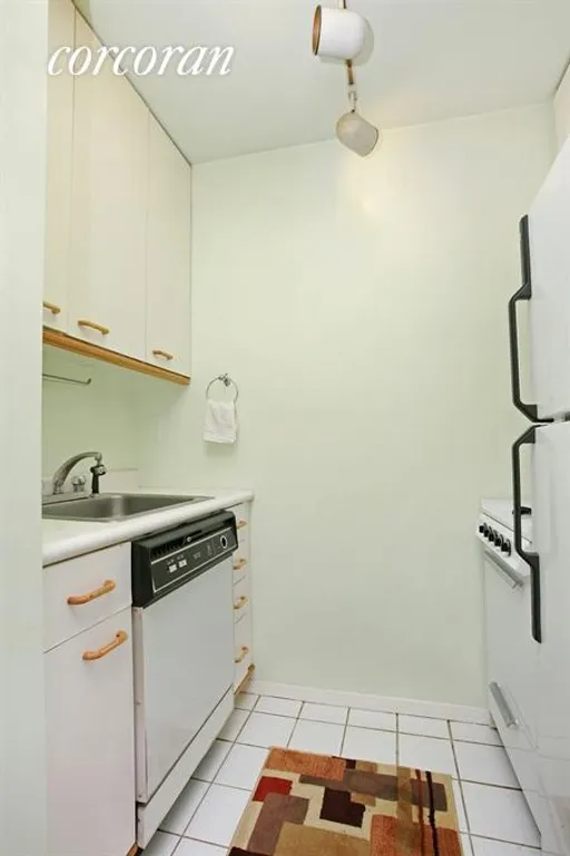 New York City Real Estate | View 393 West 49th Street, 2M | Kitchen | View 3