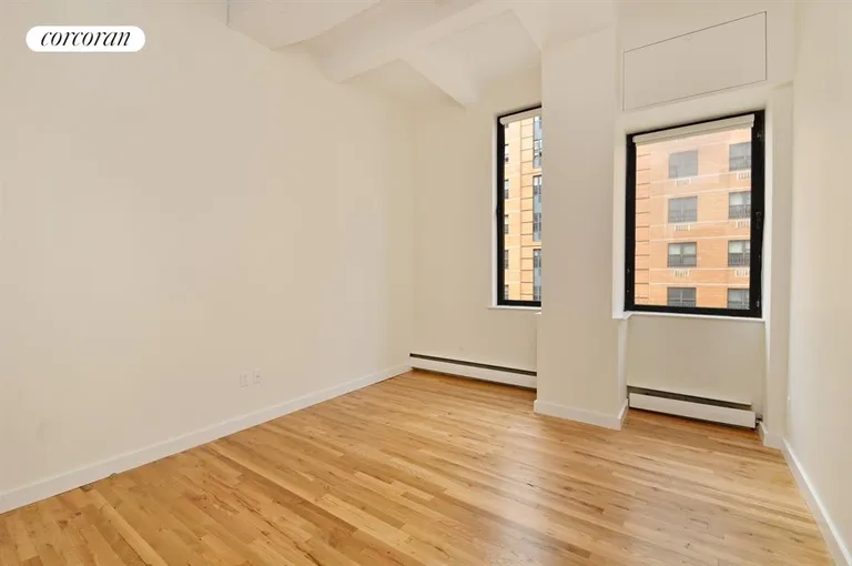 New York City Real Estate | View 114 East 13th Street, 4C | Bedrooms have large windows and double closets | View 3