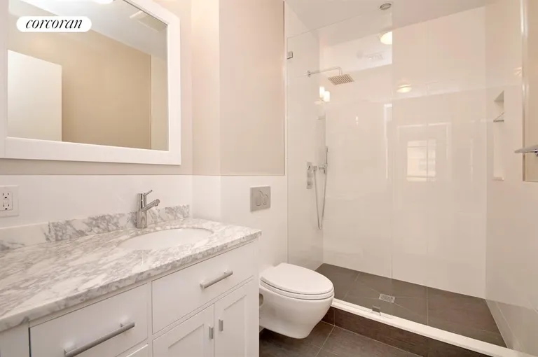 New York City Real Estate | View 114 East 13th Street, 4C | Spa-like Master Bath with Large Stall Shower | View 4