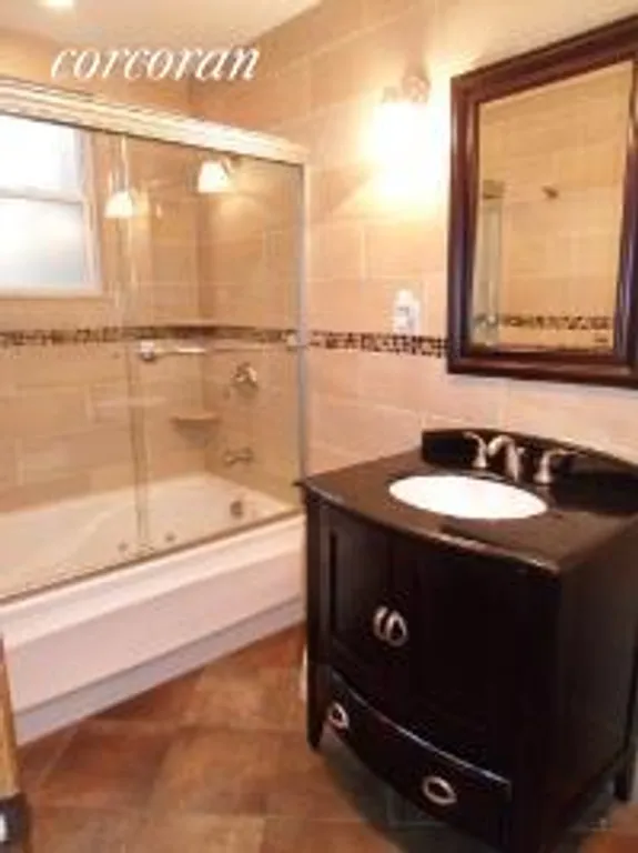New York City Real Estate | View 33 Powers Street | Renovated bathroom | View 5