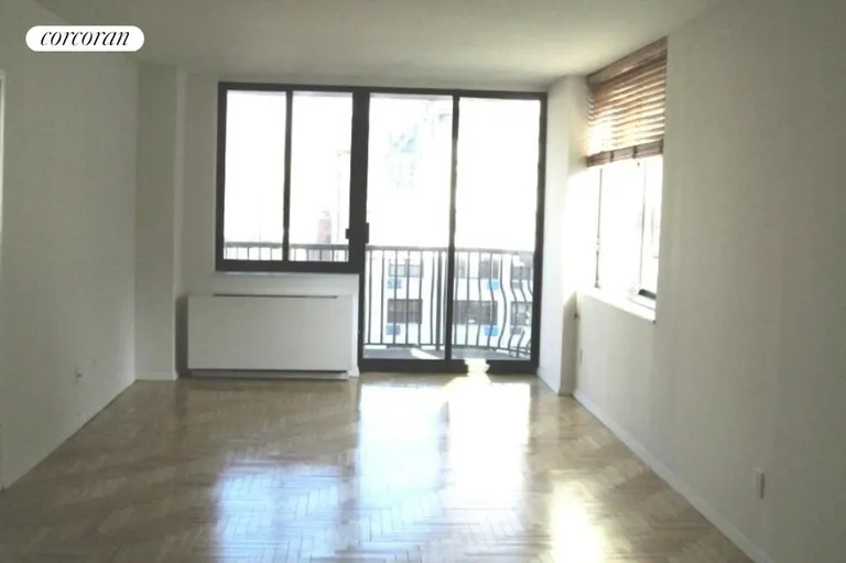 New York City Real Estate | View 343 East 74th Street, 10C | Spacious living room with balcony | View 4