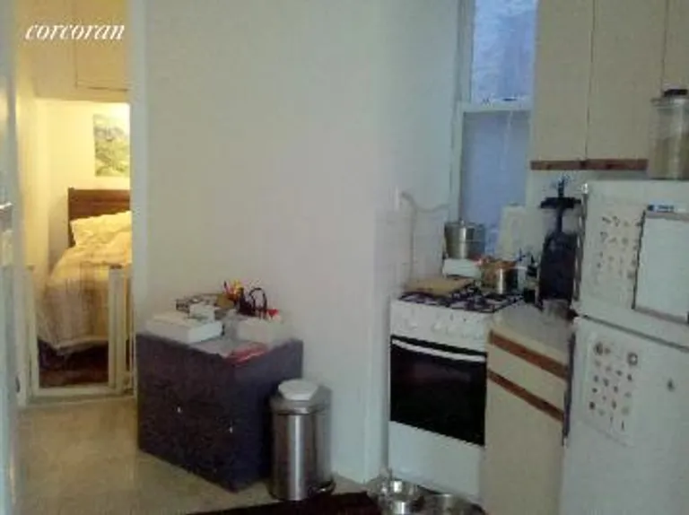 New York City Real Estate | View 71 East 3rd Street, 16 | Kitchen back towards bedroom | View 4