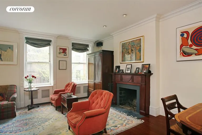 New York City Real Estate | View 116 East 91st Street, 3-4 | Living Room with Working Fireplace | View 3