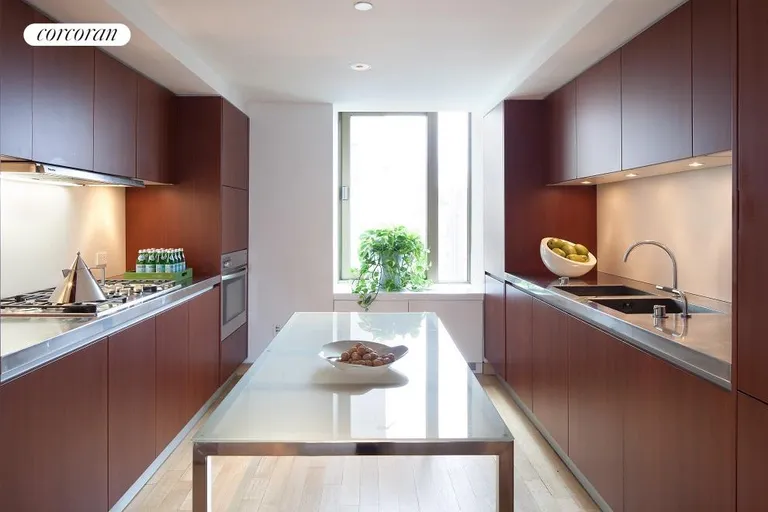 New York City Real Estate | View 50 Gramercy Park North, PH | Stainless steel counter tops & cherry cabinets | View 4