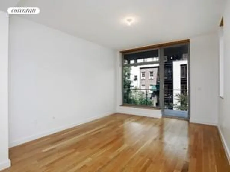 New York City Real Estate | View 333 West 14th Street, 3 | <asterBedroom with Balcony | View 4