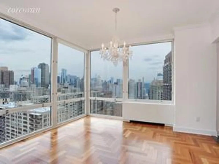 New York City Real Estate | View 220 Riverside Boulevard, 33C | S/E crnr Dining Rm w/Frl to Ceil Wind | View 2