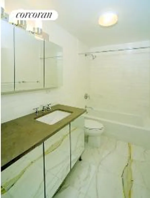 New York City Real Estate | View 200 Central Park South, 15B | Master Bath with stone and marble | View 5