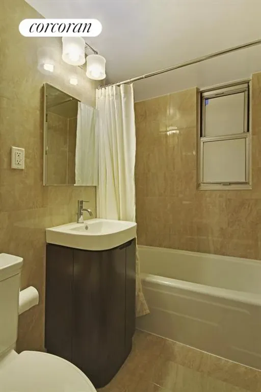 New York City Real Estate | View 77 West 55th Street, 21G | Bathroom | View 10
