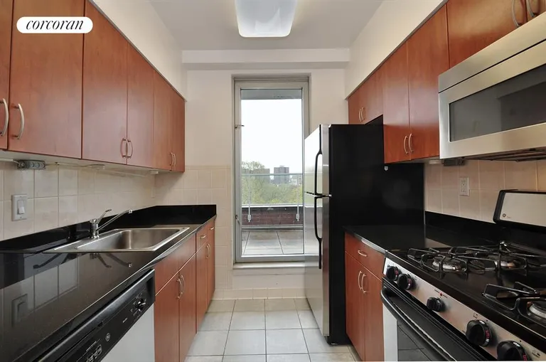 New York City Real Estate | View 330 West 145th Street, PH5 | Windowed kitchen with terrace access. | View 3