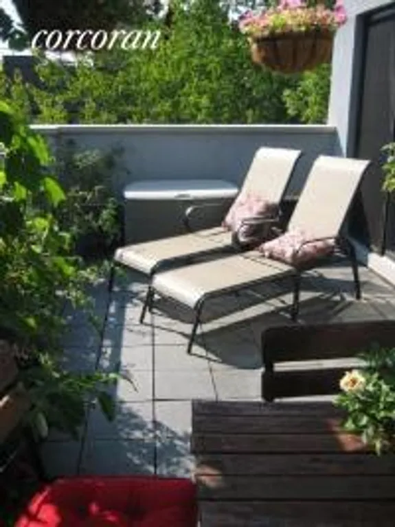 New York City Real Estate | View 580 Sterling Place, PHB | Terrace w-lounge chairs | View 9