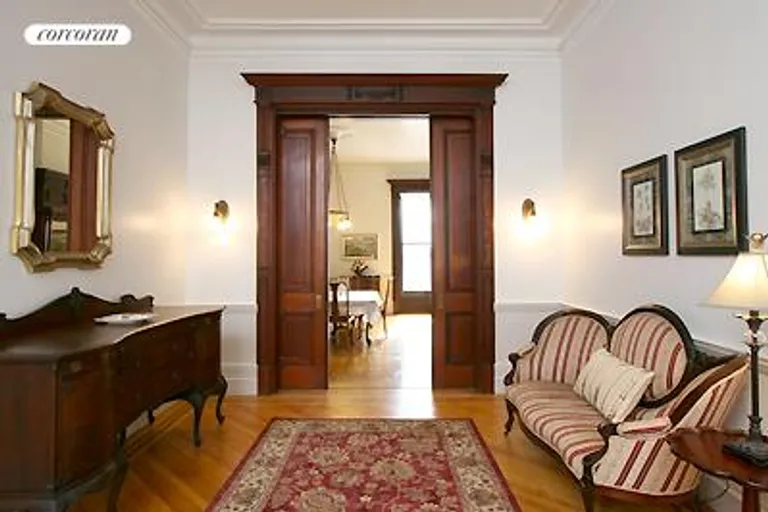 New York City Real Estate | View 854 President Street | Parlor with pocket doors onto dining room | View 8