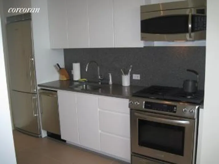 New York City Real Estate | View 105 West 29th Street, 27F | New Open Kitchen | View 3