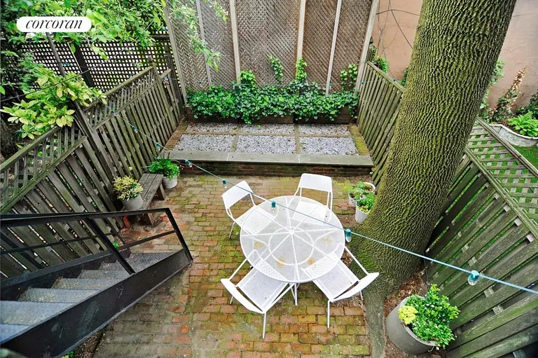 New York City Real Estate | View 57 Tompkins Place | Garden | View 4