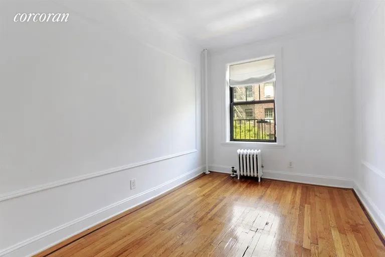 New York City Real Estate | View 85 Barrow Street, 4M | Tree Line Views from the Sunny Bedroom Window | View 2