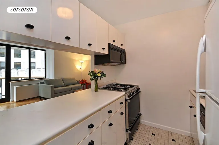 New York City Real Estate | View 45 East 25th Street, 21B | White Pass-Through Kitchen! | View 3