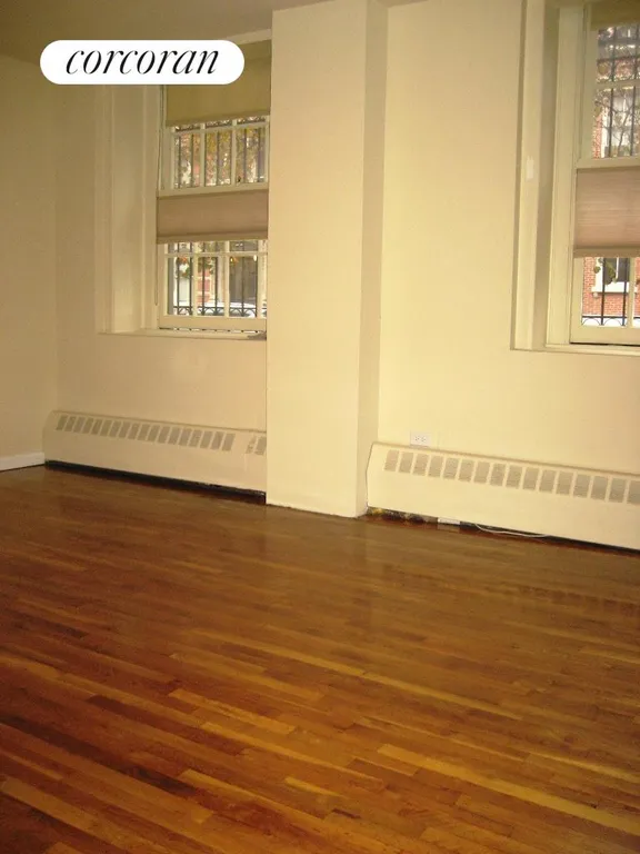 New York City Real Estate | View 29 King Street, 1H | High ceilings w/large, decorative windows. South. | View 5