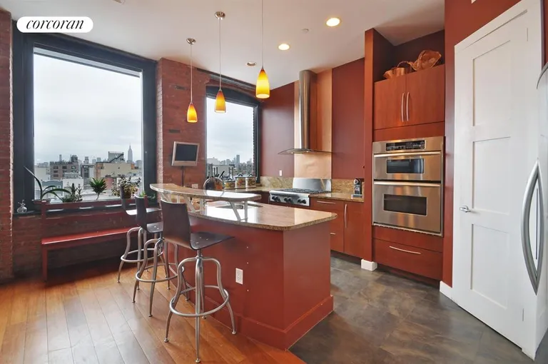 New York City Real Estate | View 500 Driggs Avenue, 613 | Granite Kitchen w. Breakfast Bar & SS appliances | View 5