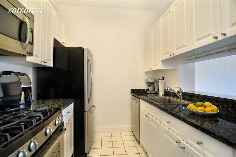 New York City Real Estate | View 350 East 82Nd Street, 8H | Kitchen with granite counters stainless appliances | View 2