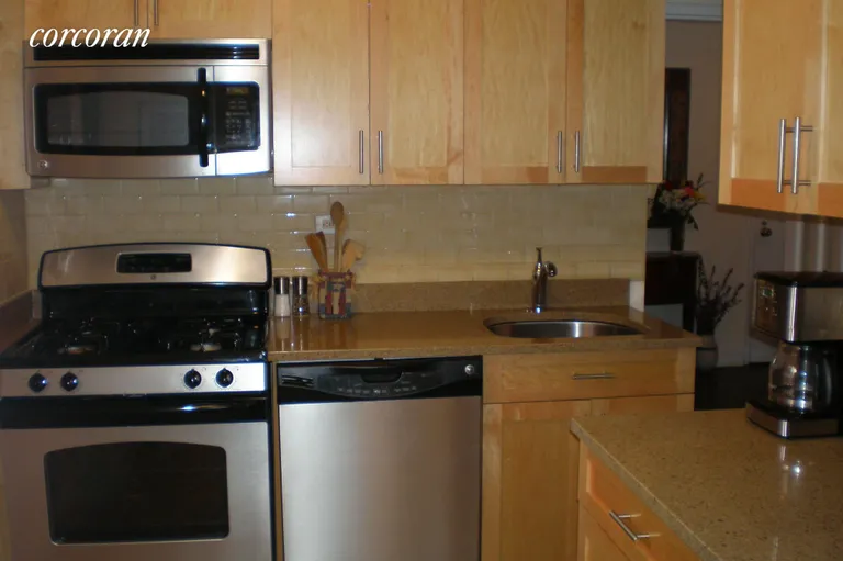 New York City Real Estate | View 305 East 40th Street, 8P | 8P-Kitchen | View 2