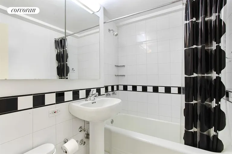New York City Real Estate | View 40 East 9th Street, 9M | Guest Bathroom | View 6