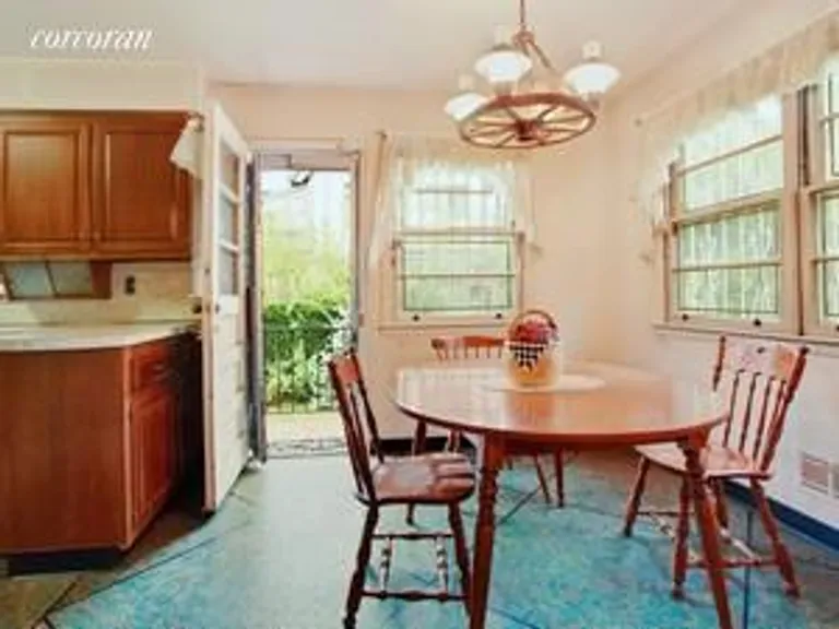 New York City Real Estate | View 180 Rugby Road | Eat in kitchen with steps to the backyar | View 2
