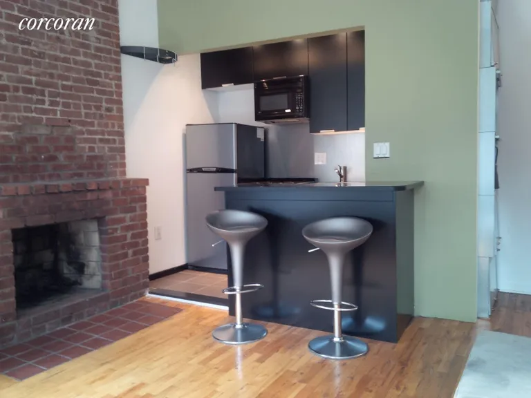 New York City Real Estate | View 327 West 85th Street, 3A | Upgraded Kitchen and Fireplace | View 2