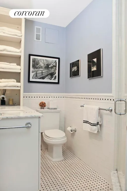 New York City Real Estate | View 23 West 73rd Street, 1109 | Marble and Tile Bathroom | View 4