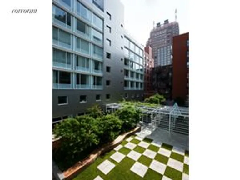 New York City Real Estate | View 11 Wooster Street | Private Garden | View 8