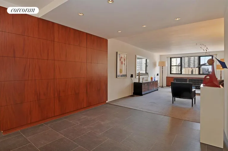 New York City Real Estate | View 315 East 72Nd Street, 15L | Mahagany back drop with Flamed granite tile | View 2
