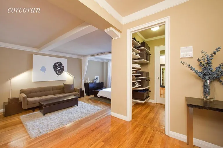 New York City Real Estate | View 200 West 20th Street, 1002 | Step down living space with beamed ceilings | View 2