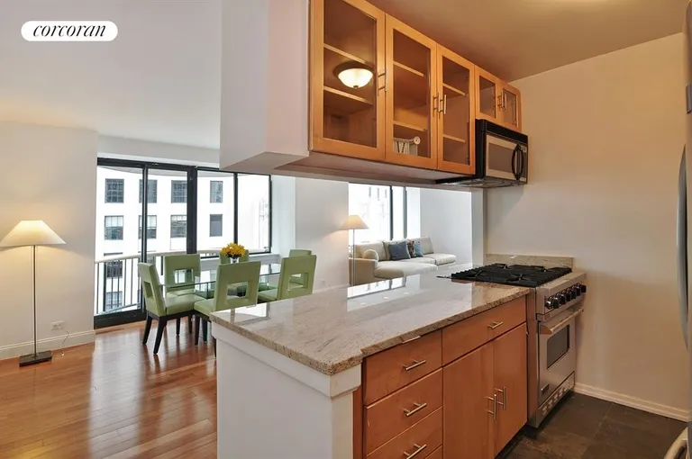New York City Real Estate | View 45 East 25th Street, 24B | Modern Kitchen, Open Onto Dining Area | View 5