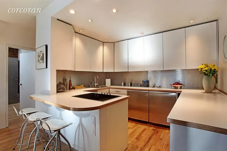 New York City Real Estate | View 356 West 23rd Street, 4B | Chef's kitchen opens into the Living/Dining room. | View 3