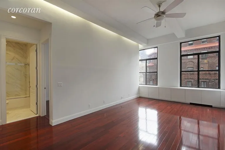 New York City Real Estate | View 244 Madison Avenue, 10I | Large and bright living room with soaring ceilings | View 2