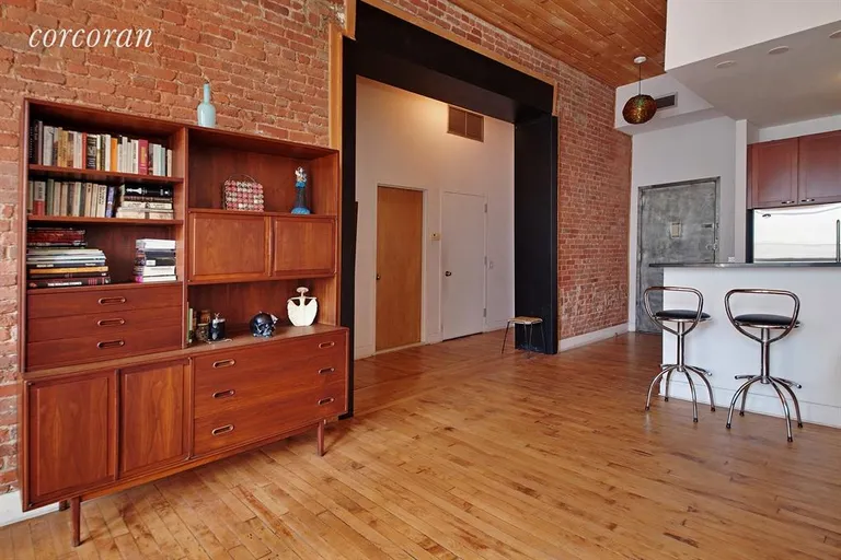 New York City Real Estate | View 138 Broadway, 3C | Gorgeous exposed brick wall | View 2