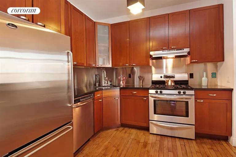 New York City Real Estate | View 138 Broadway, 3C | Sleek kitchen with stainless appliances | View 4