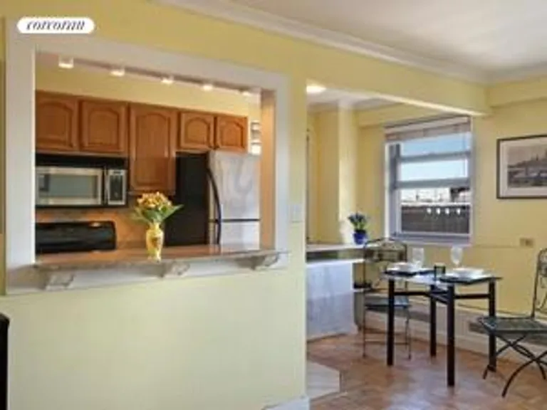 New York City Real Estate | View 175 Adams Street, 14E | Open kitchen and dining area | View 9