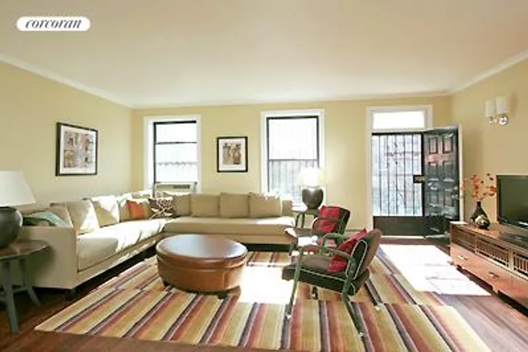 New York City Real Estate | View 12 Lincoln Place, 2 | Spacious living area w/direct access to garden | View 2