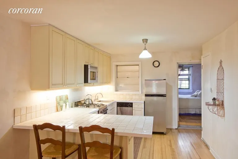 New York City Real Estate | View 117 Berkeley Place | Open Kitchen with Breakfast Bar (Rental) | View 6